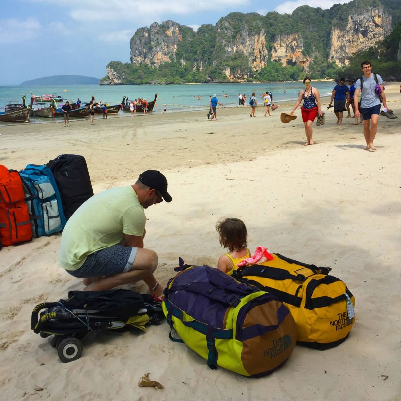 Thailand, beach, waiting for the boat - Tips for Thailand family holidays: travelling with a baby and a toddler