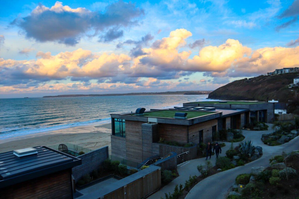 Beach huts overlooking the sea at Carbis Bay Hotel, Cornwall