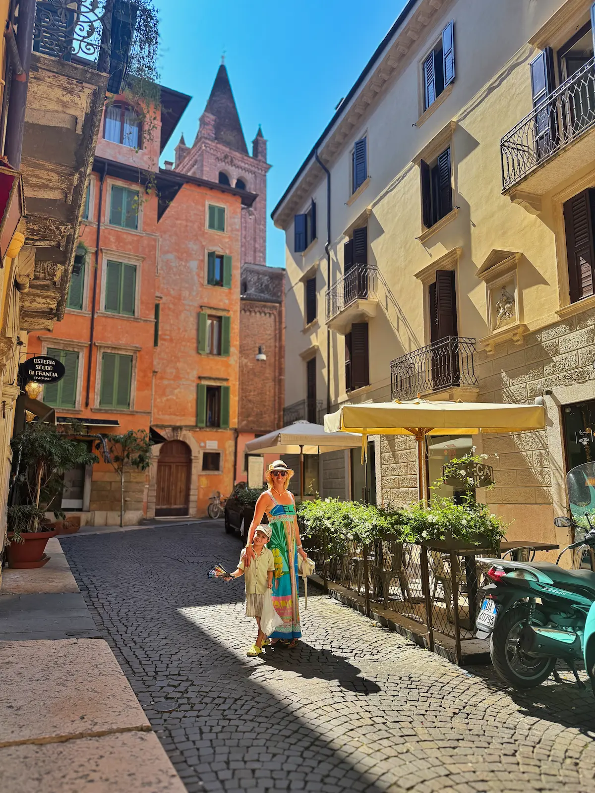 Verona buildings side street lady - angharad paull italy day trip